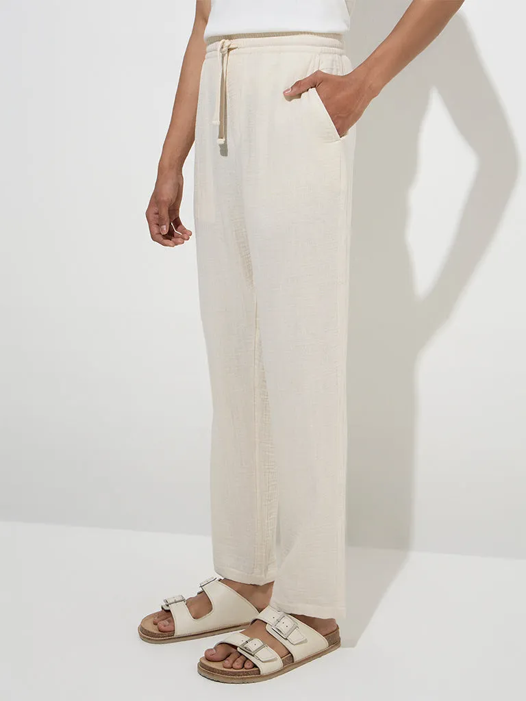 ETA Off-White Textured Relaxed-Fit Mid-Rise Cotton Chinos