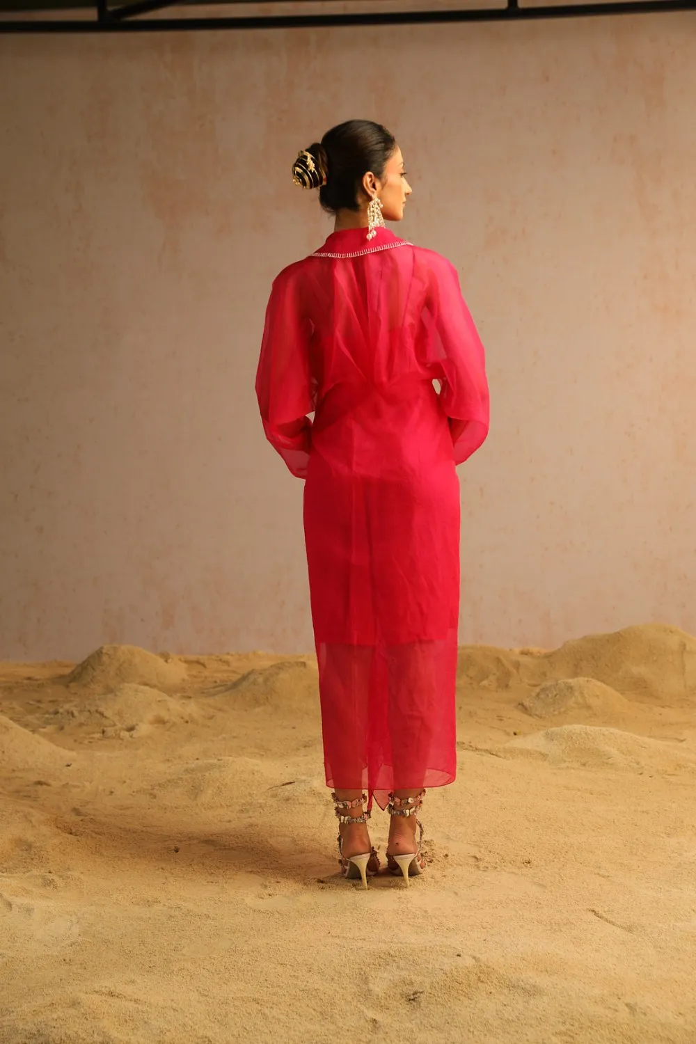 Hot pink cape with spaghetti
